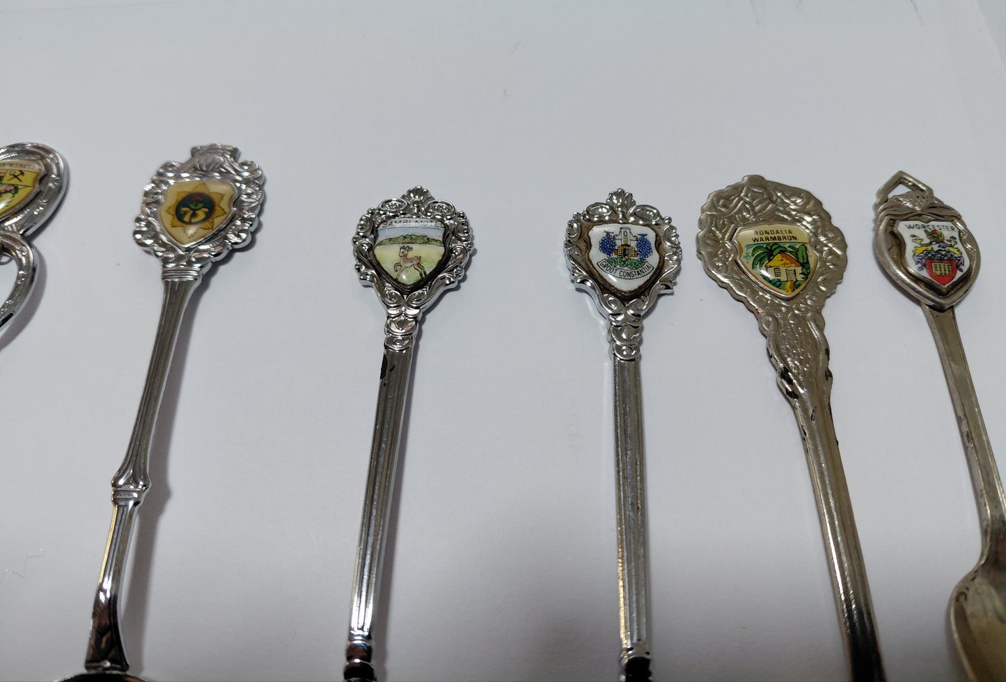 Souvenir Teaspoon & Butter Knife Collection - 9 Crested Spoons Plus 1 Butter Knife